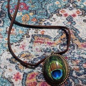 Handcrafted peacock design necklace and matching dangling  earrings.